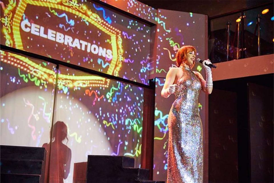 A glamorous singer on the Showboat Dinner Cruise performing live on stage